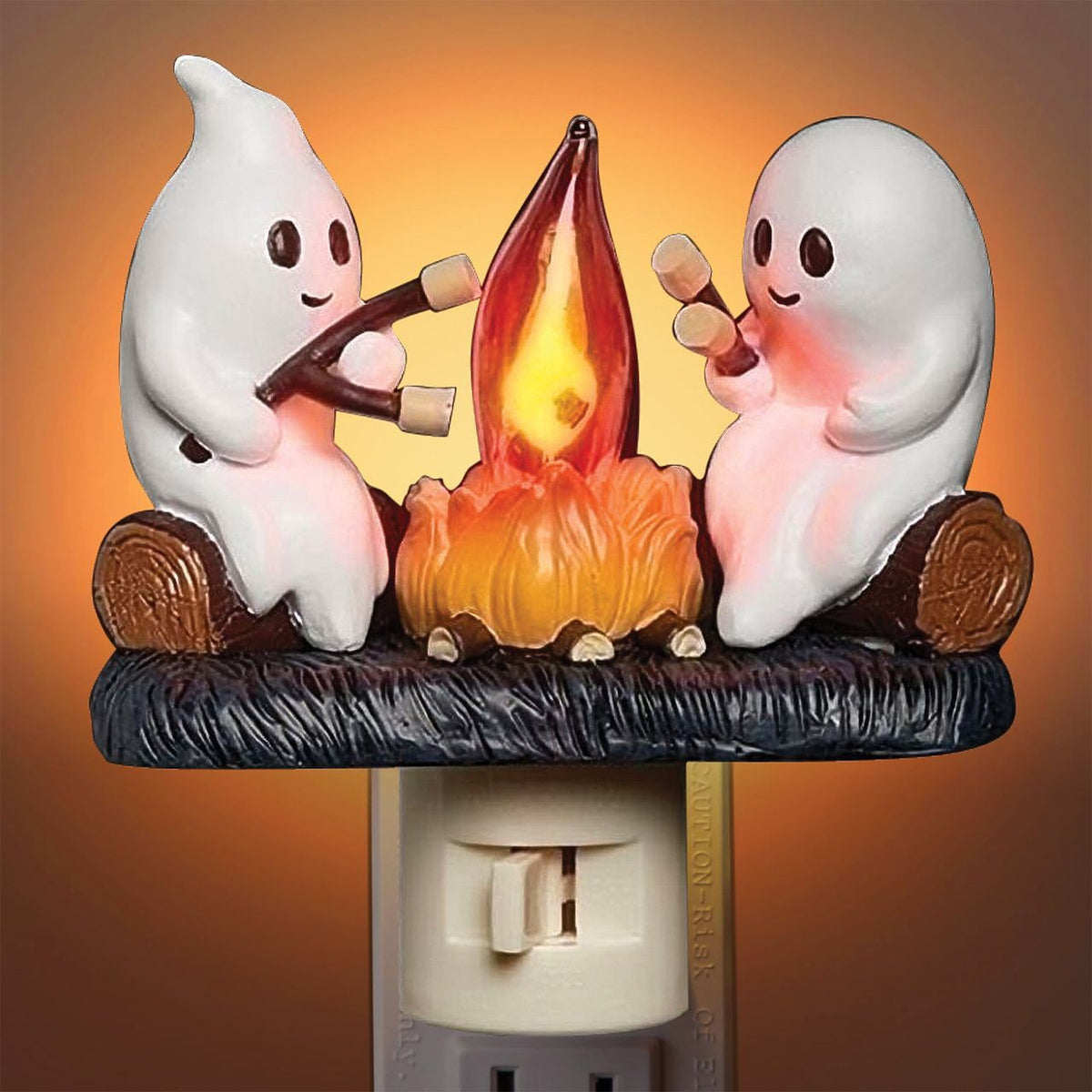 Veilleuse Halloween en résine allumée, deux fantômes grillant des chamallows